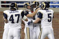 DETROIT , MI - NOVEMBER 01: Daniel Fells #46 of the  St. Louis Rams celebrates a touchdown off of a fake field goal with Josh Brown #3, Donnie Jones #5 and Billy Bajema #47 while playing the Detroit Lions on November 1, 2009 at Ford Field in Detroit, Michigan.  (Photo by Gregory Shamus/Getty Images)