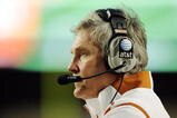 AUSTIN, TX - OCTOBER 10:  Head coach Mack Brown of the Texas Longhorns calls in a play against the Colorado Buffaloes on October 10, 2009 at Darrell K Royal-Texas Memorial Stadium in Austin, Texas.  Texas won 38-14.  (Photo by Brian Bahr/Getty Images)