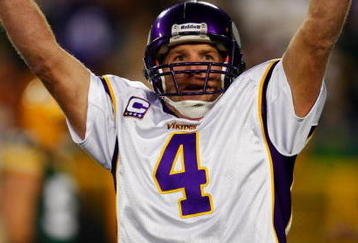 GREEN BAY, WI - NOVEMBER 01: Quarterback Brett Favre #4 of the Minnesota Vikings celebrates a touchdown by teammate Percy Harvin #12 after a 51 yard touchdown pass during the third quarter of the game against the Green Bay Packers at Lambeau Field on November 1, 2009 in Green Bay, Wisconsin. (Photo by Scott Boehm/Getty Images)