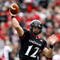 CINCINNATI - OCTOBER 24:  Zach Collaros #12 of the Cincinnati Bearcats throws the ball during the Big East Conference game against the Louisville Cardinals at Nippert Stadium on October 24, 2009 in Cincinnati, Ohio.  (Photo by Andy Lyons/Getty Images)