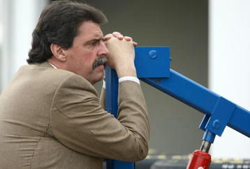 DAYTONA BEACH, FL - FEBRUARY 09: Mike Helton, President of NASCAR, stands around during practice for the Daytona 500 at Daytona International Speedway on February 9, 2008 in Daytona, Florida.  (Photo by Jonathan Ferrey/Getty Images)