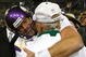 GREEN BAY, WI - NOVEMBER 1: Quarterback Brett Favre #4 of the Minnesota Vikings hugs a Packers coach after the game against the Green Bay Packers at Lambeau Field on November 1, 2009 in Green Bay, Wisconsin. The Vikings defeated the Packers 38-26. (Photo by Scott Boehm/Getty Images)