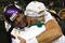 GREEN BAY, WI - NOVEMBER 1: Quarterback Brett Favre #4 of the Minnesota Vikings hugs a Packers coach after the game against the Green Bay Packers at Lambeau Field on November 1, 2009 in Green Bay, Wisconsin. The Vikings defeated the Packers 38-26. (Photo by Scott Boehm/Getty Images)
