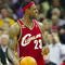 CLEVELAND - OCTOBER 27:  LeBron James #23 of the Cleveland Cavaliers reacts during the season opener against the Boston Celtics at Quicken Loans Arena on October 27, 2009 in Cleveland, Ohio.  NOTE TO USER: User expressly acknowledges and agrees that, by downloading and or using this photograph, User is consenting to the terms and conditions of the Getty Images License Agreement. (Photo by Gregory Shamus/Getty Images)