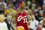 CLEVELAND - OCTOBER 27:  LeBron James #23 of the Cleveland Cavaliers reacts during the season opener against the Boston Celtics at Quicken Loans Arena on October 27, 2009 in Cleveland, Ohio.  NOTE TO USER: User expressly acknowledges and agrees that, by downloading and or using this photograph, User is consenting to the terms and conditions of the Getty Images License Agreement. (Photo by Gregory Shamus/Getty Images)