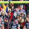 ORCHARD PARK, NY - NOVEMBER 01: Terrell Owens #81  of the Buffalo Bills dunks on the crossbar after scoring Buffalo's only touchdown against the Houston Texans  at Ralph Wilson Stadium on November 1, 2009 in Orchard Park, New York. Houston won 31-10. (Photo by Rick Stewart/Getty Images)
