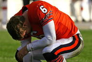 CHICAGO - NOVEMBER 01: Jay Cutler #6 of the Chicago Bears reacts after being sacked by members of the Cleveland Browns at Soldier Field on November 1, 2009 in Chicago, Illinois. The Bears defeated the Browns 30-6. (Photo by Jonathan Daniel/Getty Images)