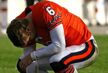 CHICAGO - NOVEMBER 01: Jay Cutler #6 of the Chicago Bears reacts after being sacked by members of the Cleveland Browns at Soldier Field on November 1, 2009 in Chicago, Illinois. The Bears defeated the Browns 30-6. (Photo by Jonathan Daniel/Getty Images)