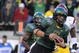 EUGENE, OR - OCTOBER 31: Quarterback Jeremiah Masoli #8 of the Oregon Ducks breaks the tackle of safety Taylor Mays #2 as he scores a touchdown in the first quarter of the game at Autzen Stadium on October 31, 2009 in Eugene, Oregon. (Photo by Steve Dykes/Getty Images)