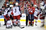 WASHINGTON - NOVEMBER 01:  Alex Ovechkin #8 of the Washington Capitals is escorted to the penalty box after receiving a roughing penalty in the second period against the Columbus Blue Jackets at the Verizon Center on November 1, 2009 in Washington, DC.  (Photo by Greg Fiume/Getty Images)