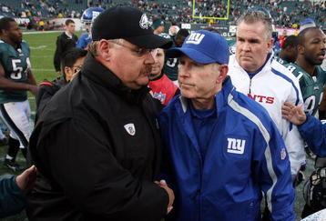 PHILADELPHIA - NOVEMBER 01:  Head coach Andy Reid of the Philadelphia Eagles shakes hands with head coach Tom Coughlin of the New York Giants after their game on November 1, 2009 at Lincoln Financial Field in Philadelphia, Pennsylvania. The Eagles defeated the Giants 40-17.  (Photo by Jim McIsaac/Getty Images)