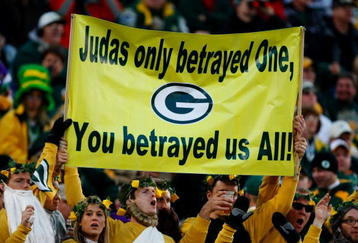 GREEN BAY, WI - NOVEMBER 01:  Fans hold a sign referring to quarterback Brett Favre #4 of the Minnesota Vikings during the game against the Green Bay Packers at Lambeau Field on November 1, 2009 in Green Bay, Wisconsin. (Photo by Scott Boehm/Getty Images)