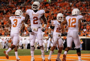 STILLWATER, OK - OCTOBER 31:  Earl Thomas #12 Sergio Kindle #2 of the Texas Longhorns celebrates a touchdown scored by teammate Earl Thomas #12 (R) on an interception in the third quarter against the Oklahoma State Cowboys at Boone Pickens Stadium on October 31, 2009 in Stillwater, Oklahoma.  (Photo by Ronald Martinez/Getty Images)