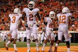 STILLWATER, OK - OCTOBER 31:  Earl Thomas #12 Sergio Kindle #2 of the Texas Longhorns celebrates a touchdown scored by teammate Earl Thomas #12 (R) on an interception in the third quarter against the Oklahoma State Cowboys at Boone Pickens Stadium on October 31, 2009 in Stillwater, Oklahoma.  (Photo by Ronald Martinez/Getty Images)