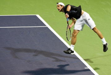 SHANGHAI, CHINA - OCTOBER 15:  Jurgen Melzer of Austria serves to Feliciano Lopez of Spain during day five of 2009 Shanghai ATP Masters 1000 at Qi Zhong Tennis Centre on October 15, 2009 in Shanghai, China.  (Photo by Victor Fraile/Getty Images)