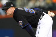 NEW YORK - MAY 08: J.J. Putz #22 of the New York Mets throws a pitch against the Pittsburgh Pirates on May 8, 2009 at Citi Field in the Flushing neighborhood of the Queens borough of New York City. The Mets defeated the Pirates 7-3. (Photo by Jim McIsaac/Getty Images)