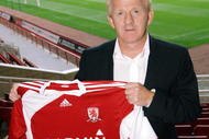 MIDDLESBROUGH, UNITED KINGDOM - OCTOBER 26:  Gordon Strachan poses with a club shirt after a press conference held to present him as the new Middlesbrough manager at the Riverside Stadium on October 26, 2009 in Middlesbrough, England. (Photo by Barry Pells/Getty Images)