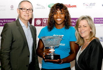 DOHA, QATAR - NOVEMBER 01:  Aldo Liguori, head of global public relations for Sony Ericsson and Sony Ericsson WTA Tour CEO Stacey Allaster pose with Serena Williams (C) after she was presented a trophy to commerate finishing the year as number 1 in the Sony Ericsson WTA Tour rankings after the final of the Sony Ericsson WTA Championships at the Khalifa International Tennis and Squash Complex on November 1, 2009 in Doha, Qatar.  (Photo by Matthew Stockman/Getty Images)