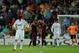 MADRID, SPAIN - OCTOBER 21:  Kaka (L) of Real Madrid stands dejected after conceding a goal as AC Milan players celebrate in the background during the Champions League group C match between Real Madrid and AC Milan at the Estadio Santiago Bernabeu on October 21, 2009 in Madrid, Spain. AC Milan won the match 3-2.  (Photo by Jasper Juinen/Getty Images)