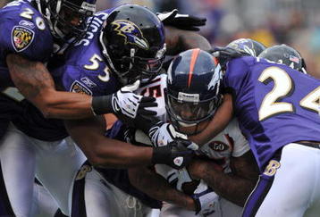 BALTIMORE - NOVEMBER 1:  Brandon Marshall #15 of the Denver Broncos runs the ball against the Baltimore Ravens at M&T Bank Stadium on November 1, 2009 in Baltimore, Maryland. (Photo by Larry French/Getty Images)