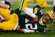 GREEN BAY, WI - NOVEMBER 01: Quarterback Aaron Rodgers #12 of the Green Bay Packers is sacked during the third quarter of the game against the Minnesota Vikings at Lambeau Field on November 1, 2009 in Green Bay, Wisconsin. (Photo by Scott Boehm/Getty Images)