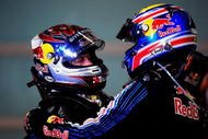 ABU DHABI, UNITED ARAB EMIRATES - NOVEMBER 01:  Sebastian Vettel (L) of Germany and Red Bull Racing celebrates with second placed team mate Mark Webber  (R)of Australia and Red Bull Racing in parc ferme after winning the Abu Dhabi Formula One Grand Prix at the Yas Marina Circuit on November 1, 2009 in Abu Dhabi, United Arab Emirates.  (Photo by Clive Mason/Getty Images)