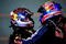 ABU DHABI, UNITED ARAB EMIRATES - NOVEMBER 01:  Sebastian Vettel (L) of Germany and Red Bull Racing celebrates with second placed team mate Mark Webber  (R)of Australia and Red Bull Racing in parc ferme after winning the Abu Dhabi Formula One Grand Prix at the Yas Marina Circuit on November 1, 2009 in Abu Dhabi, United Arab Emirates.  (Photo by Clive Mason/Getty Images)