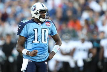 NASHVILLE, TN - NOVEMBER 01:  Vince Young #10 of the Tennessee Titans pumps his fist after making a play against the Jacksonville Jaguars during their game at LP Field on November 1, 2009 in Nashville, Tennessee.  (Photo by Streeter Lecka/Getty Images)