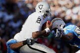 SAN DIEGO, CA - NOVEMBER 1:   Quarterback JaMarcus Russell #2 of the Oakland Raiders is sacked by Steve Gregory #28 of the San DIego Chargers in the 2nd half on November 1, 2009 at Qualcomm Stadium in San Diego, California. (Photo By Donald Miralle/Getty Images)