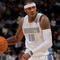 DENVER - OCTOBER 28:  Carmelo Anthony #15 of the Denver Nuggets dribbles the ball upcourt against the Utah Jazz during NBA action at Pepsi Center on October 28, 2009 in Denver, Colorado. The Nuggets defeated the Jazz 114-105.  (Photo by Doug Pensinger/Getty Images)