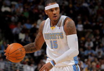 DENVER - OCTOBER 28:  Carmelo Anthony #15 of the Denver Nuggets dribbles the ball upcourt against the Utah Jazz during NBA action at Pepsi Center on October 28, 2009 in Denver, Colorado. The Nuggets defeated the Jazz 114-105.  (Photo by Doug Pensinger/Getty Images)
