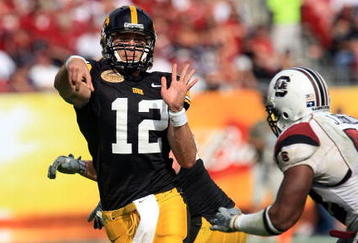 TAMPA, FL - JANUARY 01:  Ricky Stanzi #12 of the Iowa Hawkeyes drops back to pass against the South Carolina Gamecocks during the Outback Bowl on January 1, 2009 at Raymond James Stadium in Tampa, Florida.  (Photo by Scott Halleran/Getty Images)