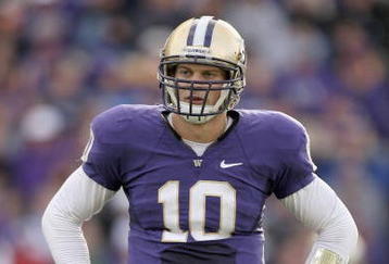 SEATTLE - OCTOBER 24: Quarterback Jake Locker #10 of the Washington Huskies looks to the sideline during the game against the Oregon Ducks on October 24, 2009 at Husky Stadium in Seattle, Washington. The Ducks defeated the Huskies 43-19. (Photo by Otto Greule Jr/Getty Images)