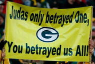 GREEN BAY, WI - NOVEMBER 01: Fans hold a sign referring to quarterback Brett Favre #4 of the Minnesota Vikings during the game against the Green Bay Packers at Lambeau Field on November 1, 2009 in Green Bay, Wisconsin. (Photo by Scott Boehm/Getty Images)