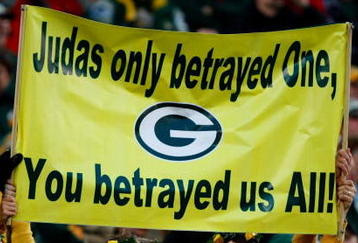 GREEN BAY, WI - NOVEMBER 01:  Fans hold a sign referring to quarterback Brett Favre #4 of the Minnesota Vikings during the game against the Green Bay Packers at Lambeau Field on November 1, 2009 in Green Bay, Wisconsin. (Photo by Scott Boehm/Getty Images)