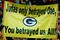GREEN BAY, WI - NOVEMBER 01:  Fans hold a sign referring to quarterback Brett Favre #4 of the Minnesota Vikings during the game against the Green Bay Packers at Lambeau Field on November 1, 2009 in Green Bay, Wisconsin. (Photo by Scott Boehm/Getty Images)