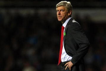 LONDON, ENGLAND - OCTOBER 25:  Arsenal manager Arsene Wenger reacts during the Barclays Premier League match between West Ham United and Arsenal at Boleyn Ground on October 25, 2009 in London, England.  (Photo by Clive Rose/Getty Images)