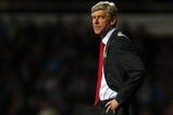 LONDON, ENGLAND - OCTOBER 25:  Arsenal manager Arsene Wenger reacts during the Barclays Premier League match between West Ham United and Arsenal at Boleyn Ground on October 25, 2009 in London, England.  (Photo by Clive Rose/Getty Images)
