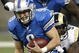 DETROIT , MI - NOVEMBER 01:  Matthew Stafford #9 of the Detroit Lions is tackled by Leonard Little #91 of the St. Louis Rams on November 1, 2009 at Ford Field in Detroit, Michigan.  (Photo by Gregory Shamus/Getty Images)