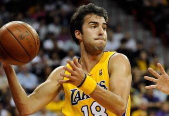 LAS VEGAS - OCTOBER 15:  Sasha Vujacic #18 of the Los Angeles Lakers looks to pass against the Sacramento Kings during their preseason game at the Thomas & Mack Center October 15, 2009 in Las Vegas, Nevada. NOTE TO USER: User expressly acknowledges and agrees that, by downloading and/or using this Photograph, user is consenting to the terms and conditions of the Getty Images License Agreement.  (Photo by Ethan Miller/Getty Images)