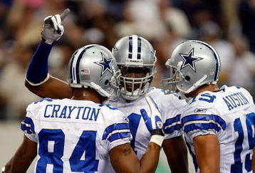 ARLINGTON, TX - NOVEMBER 01:  Wide receiver Roy Williams #11 celebrates a touchdown with Patrick Crayton #84 and Miles Austin #18 of the Dallas Cowboys at Cowboys Stadium on November 1, 2009 in Arlington, Texas.  (Photo by Ronald Martinez/Getty Images)