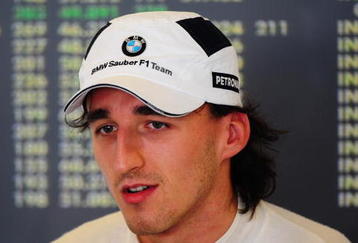 ABU DHABI, UNITED ARAB EMIRATES - OCTOBER 30:  Robert Kubica of Poland and BMW Sauber prepares to drive during practice for the Abu Dhabi Formula One Grand Prix at the Yas Marina Circuit on October 30, 2009 in Abu Dhabi, United Arab Emirates.  (Photo by Clive Mason/Getty Images)