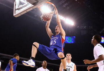 INDIANAPOLIS - MARCH 27:  Cole Aldrich #45 of the Kansas Jayhawks dunks against the Michigan State Spartans during the third round of the NCAA Division I Men's Basketball Tournament at the Lucas Oil Stadium on March 27, 2009 in Indianapolis, Indiana.  (Photo by Andy Lyons/Getty Images)