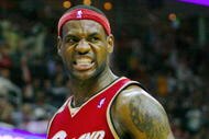 CLEVELAND - OCTOBER 27:  LeBron James #23 of the Cleveland Cavaliers reacts during the season opener against the Boston Celtics at Quicken Loans Arena on October 27, 2009 in Cleveland, Ohio.  NOTE TO USER: User expressly acknowledges and agrees that, by downloading and or using this photograph, User is consenting to the terms and conditions of the Getty Images License Agreement. (Photo by Gregory Shamus/Getty Images)