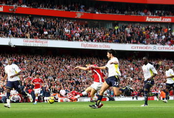 LONDON, ENGLAND - OCTOBER 31:  Cesc Fabregas of Arsenal scores the second goal during the Barclays Premier League match between Arsenal and Tottenham Hotspur at the Emirates Stadium on October 31, 2009 in London, England.  (Photo by Shaun Botterill/Getty Images)