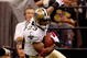 NEW ORLEANS - OCTOBER 04:  Pierre Thomas #23 of the New Orleans Saints avoids a tackle by Dwight Lowery #21 of the New York Jets at the Louisana Superdome on October 4, 2009 in New Orleans, Louisiana.  (Photo by Chris Graythen/Getty Images)