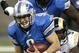 DETROIT , MI - NOVEMBER 01:  Matthew Stafford #9 of the Detroit Lions is tackled by Leonard Little #91 of the St. Louis Rams on November 1, 2009 at Ford Field in Detroit, Michigan.  (Photo by Gregory Shamus/Getty Images)