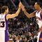 PHOENIX - OCTOBER 30:  Steve Nash #13 and Channing Frye #8 of the Phoenix Suns high five after scoring against the Golden State Warriors during the NBA game at US Airways Center on October 30, 2009 in Phoenix, Arizona. The Suns defeated the Warriors 123-101.  NOTE TO USER: User expressly acknowledges and agrees that, by downloading and or using this photograph, User is consenting to the terms and conditions of the Getty Images License Agreement.  (Photo by Christian Petersen/Getty Images)