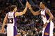 PHOENIX - OCTOBER 30:  Steve Nash #13 and Channing Frye #8 of the Phoenix Suns high five after scoring against the Golden State Warriors during the NBA game at US Airways Center on October 30, 2009 in Phoenix, Arizona. The Suns defeated the Warriors 123-101.  NOTE TO USER: User expressly acknowledges and agrees that, by downloading and or using this photograph, User is consenting to the terms and conditions of the Getty Images License Agreement.  (Photo by Christian Petersen/Getty Images)