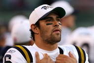 EAST RUTHERFORD, NJ - NOVEMBER 01: Mark Sanchez #6 of the New York Jets stands on the sideline during the 4th quarter against the Miami Dolphins at Giants Stadium on November 1, 2009 in East Rutherford, New Jersey. (Photo by Chris Trotman/Getty Images)